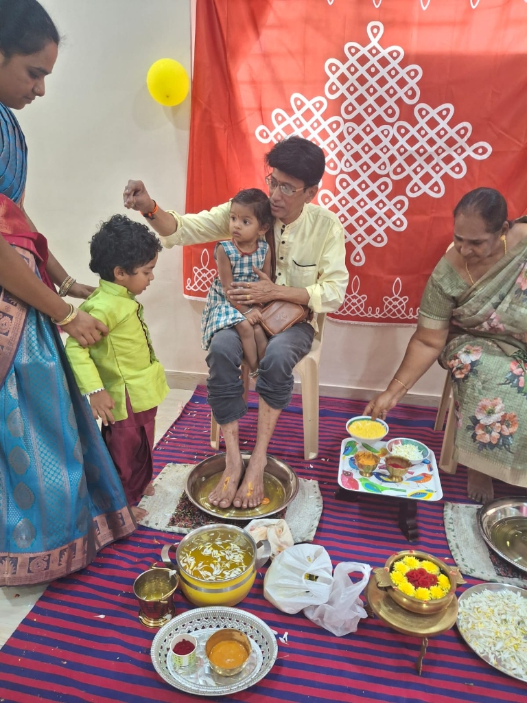 Children and family participating in a traditional ceremony at Geeths Kids School